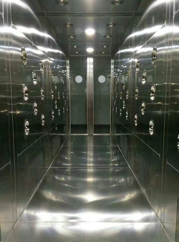 檢查風淋室風機是否正常工作，是否有異物堵塞。